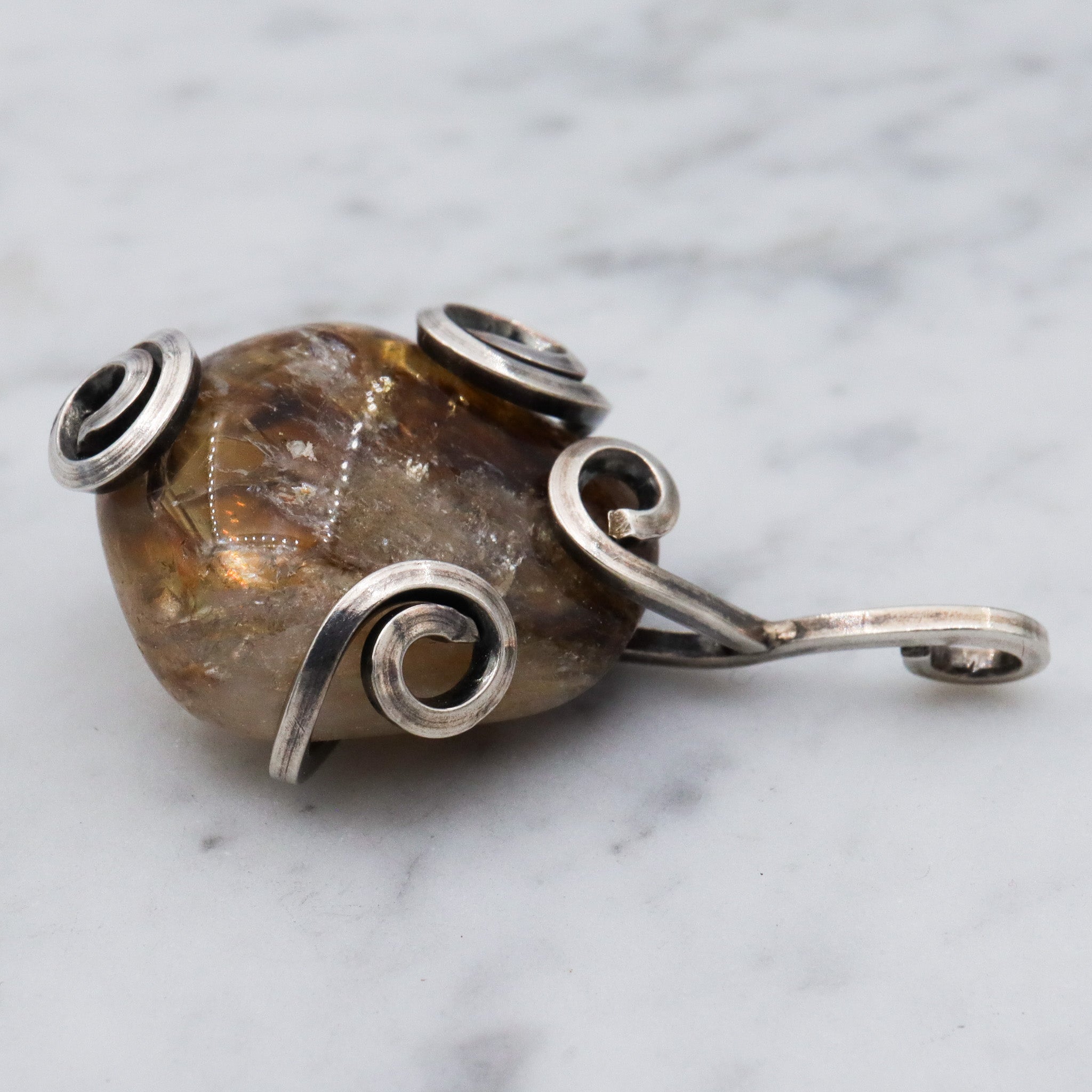 Vintage handmade sterling silver wrapped quartz pendant